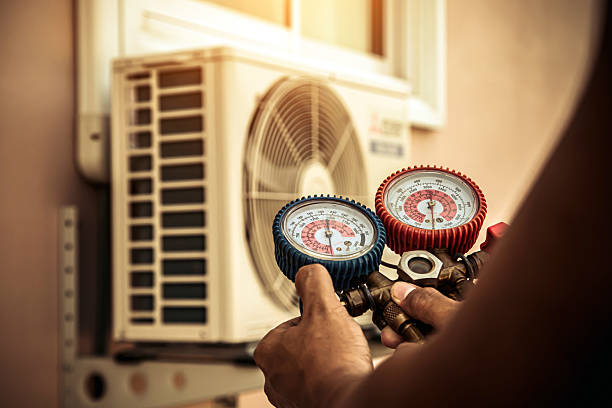 Professional Air Conditioning Service technician working in Hanscom AFB, MA